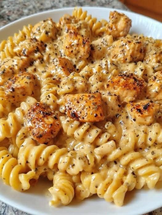 CHEESY CAJUN GARLIC CHICKEN ROTINI SKILLET