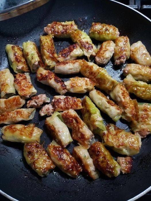 Potstickers! Potstickers filling wrapped in cabbage and fried in sesame oil!